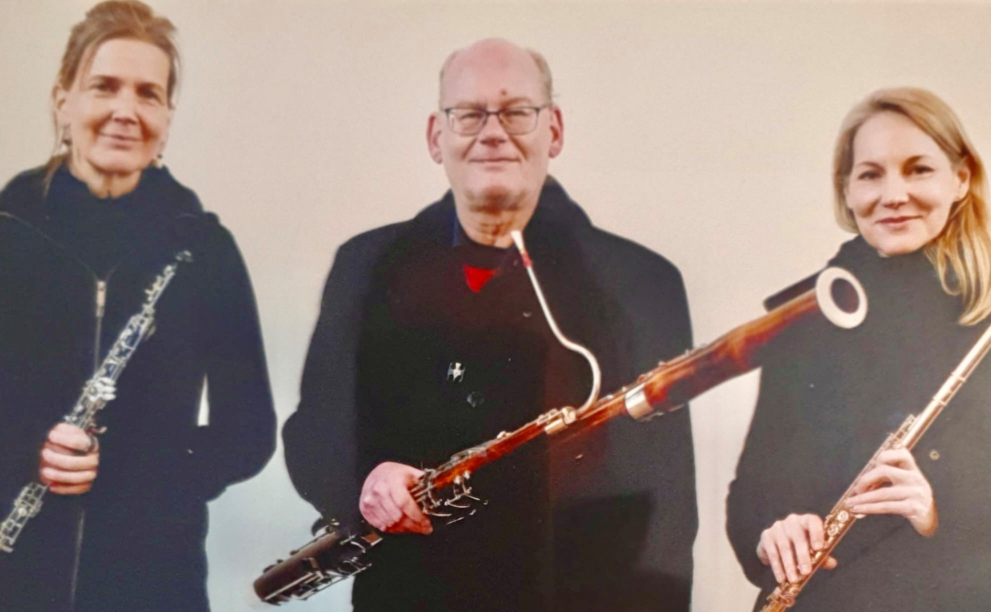 Drei Personen mit Oboe, Fagott und Flöte