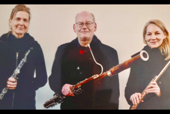 Drei Personen mit Oboe, Fagott und Flöte